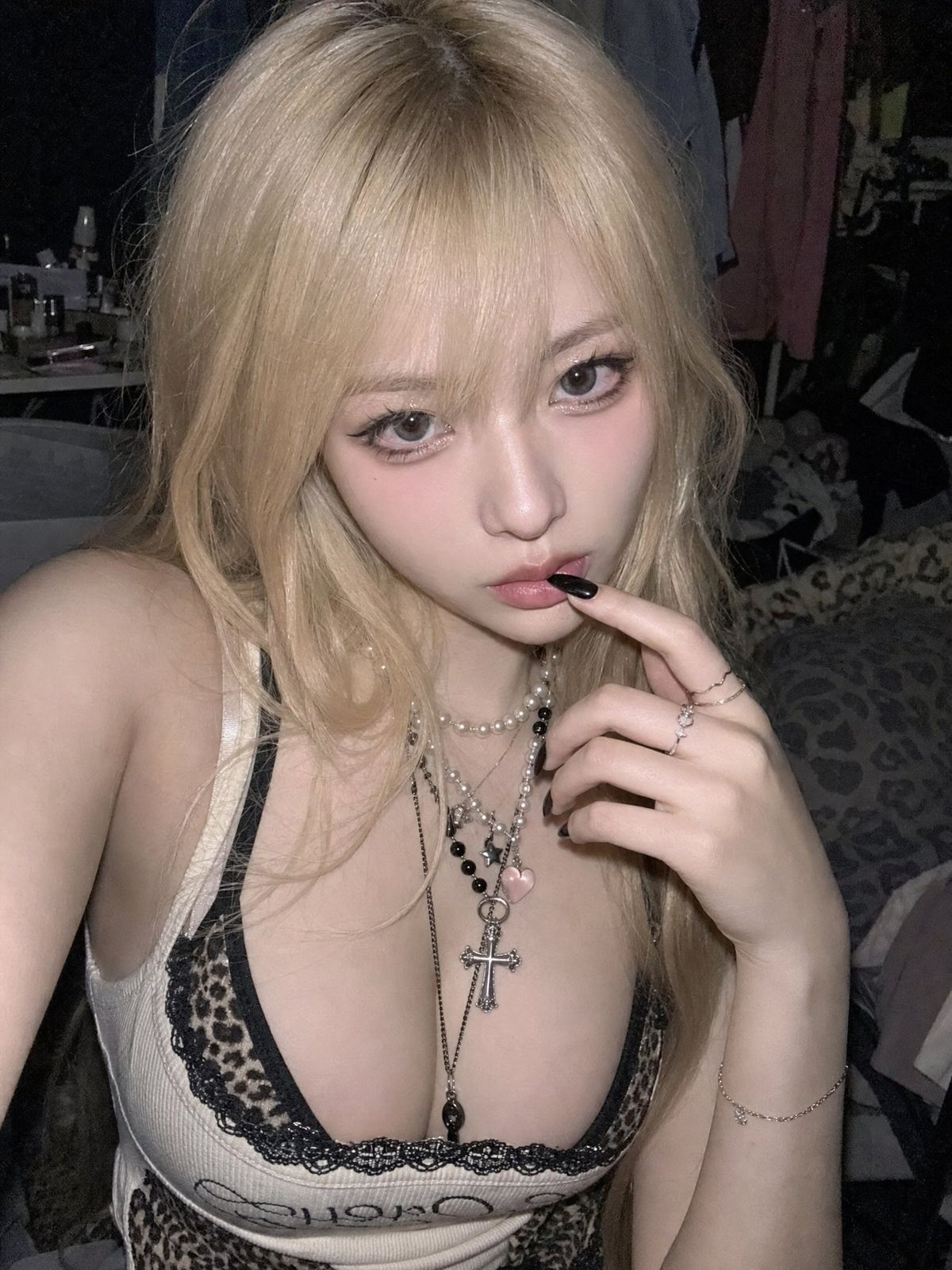 Dim bedroom blonde phone selfie: GPT Image 2 prompt