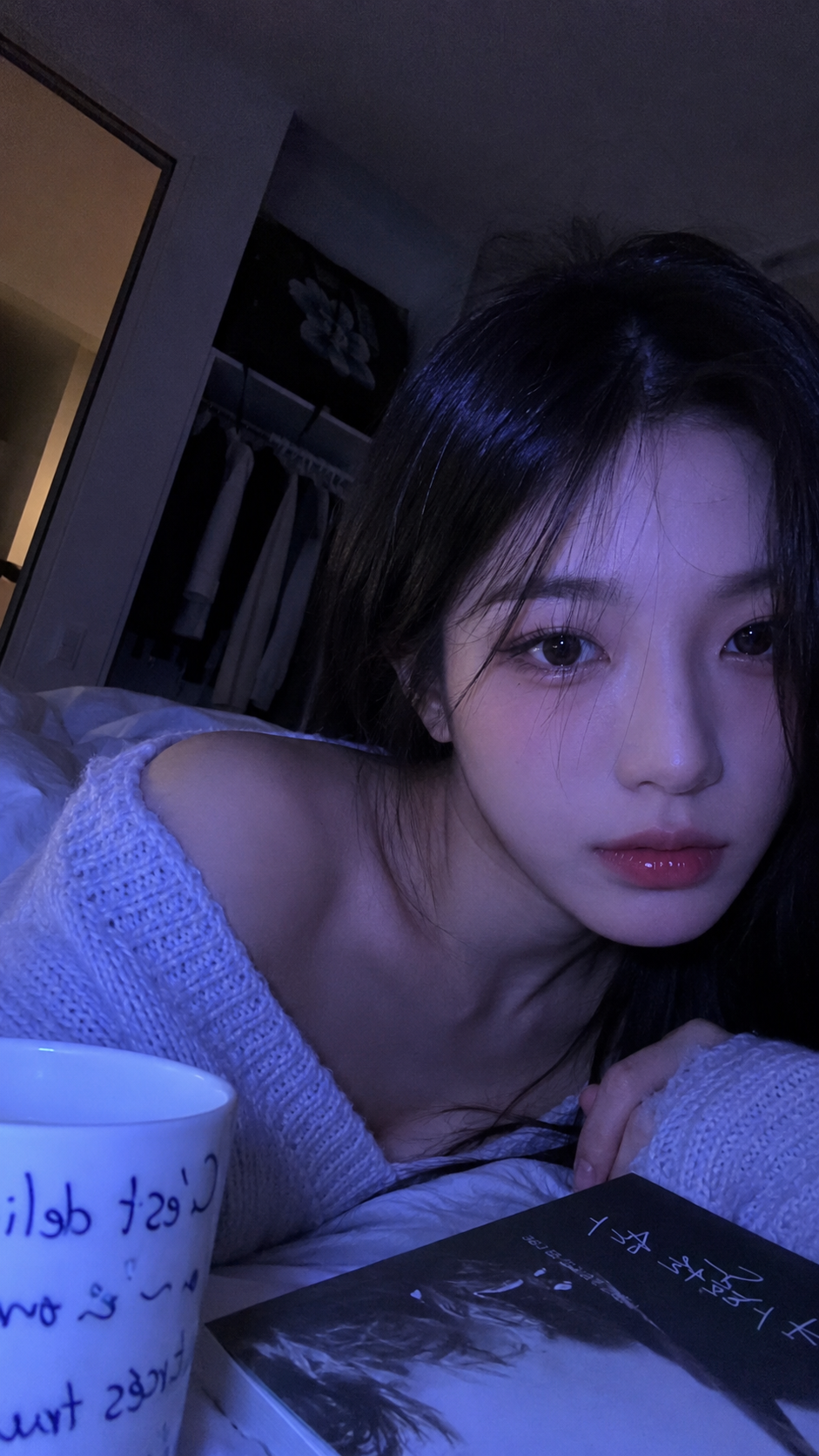 Vertical 9:16 close-up nighttime bedroom phone selfie portrait
