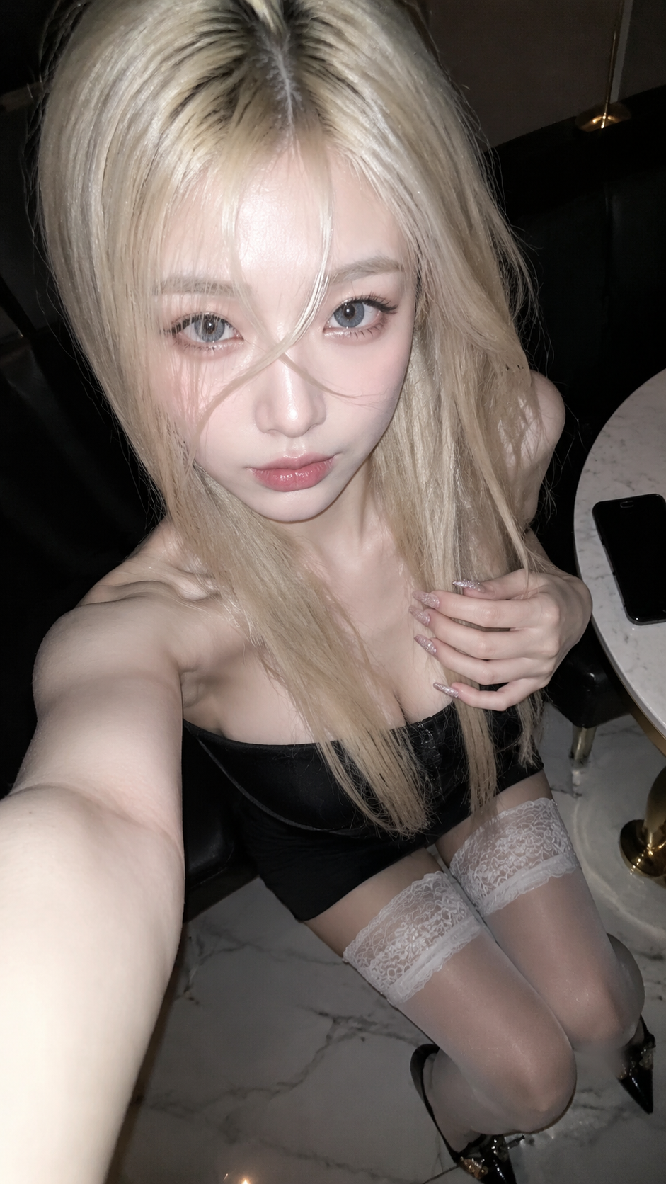 A realistic vertical 9:16 phone selfie, shot from an extremely close high angle,